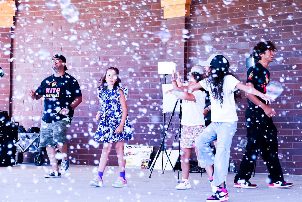 kids dancing at the kit festival